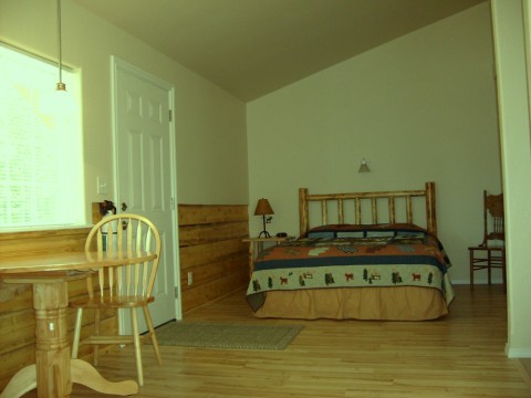 TV, a private bath, wi-fi and cozy gas fireplace in all suites & cabins