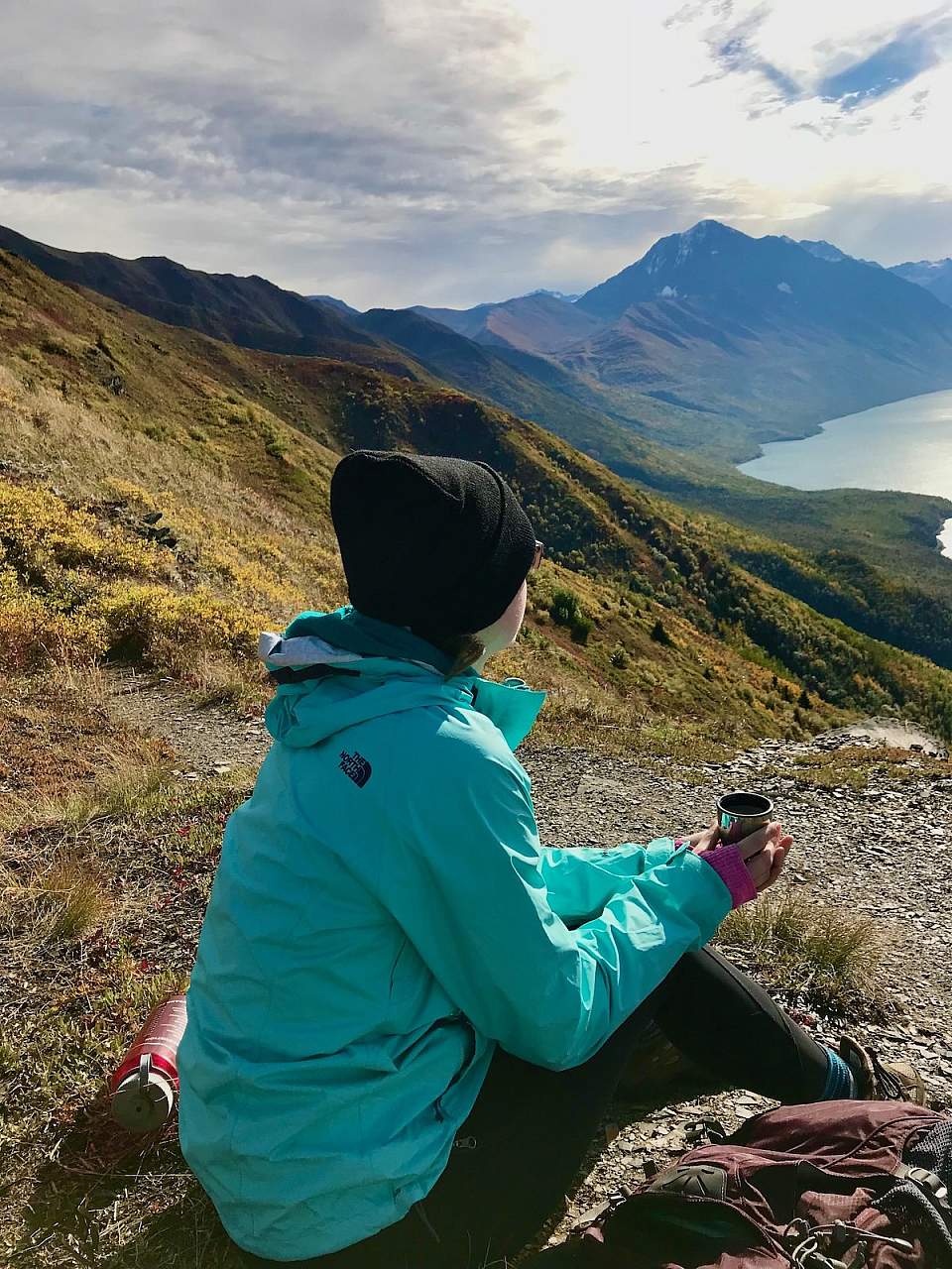 Woman wears fall clothing during a hike