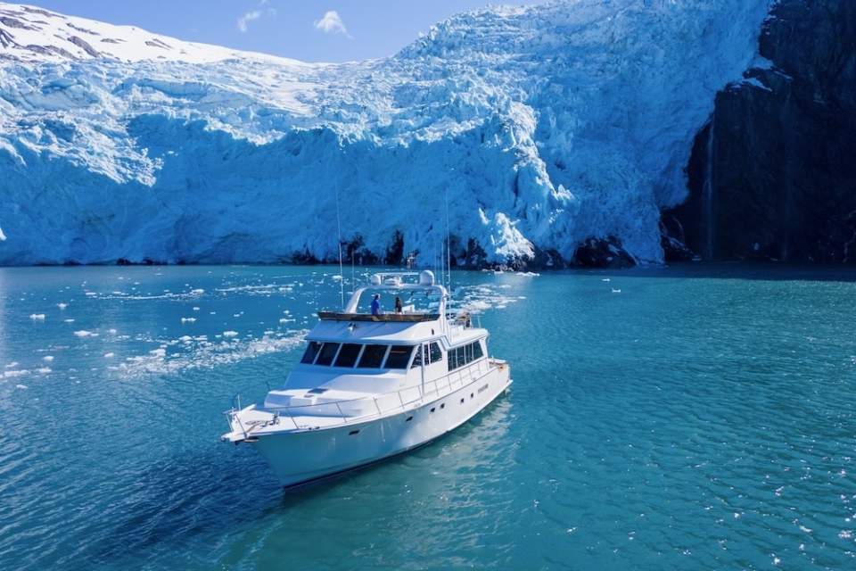 Alaskan Luxury Cruises pauses in front of a glacier in Prince William Sound