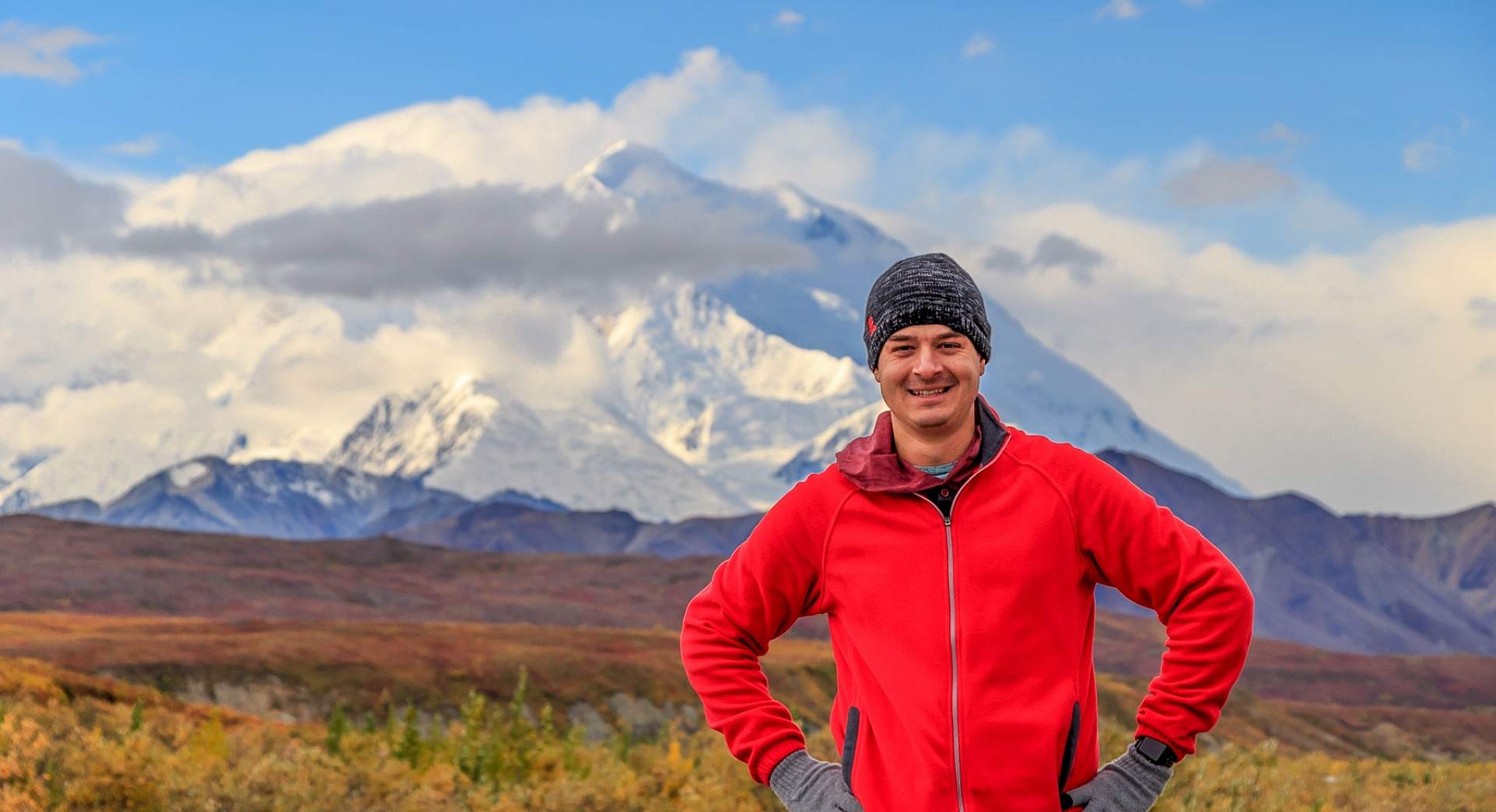 Alexyn Scheller stands in from of Denali in Denali National Park