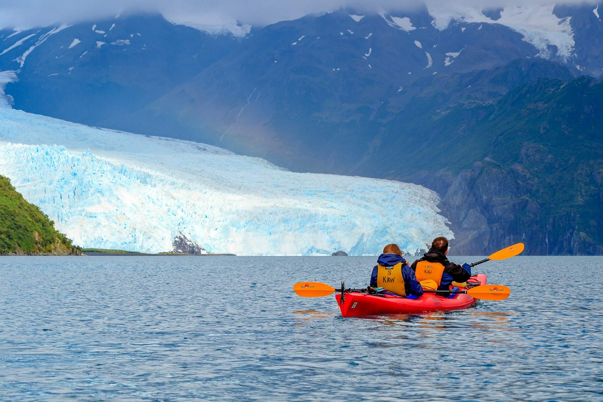 Kayak in front of Aialik Glacier in Kenai Fjords National Park