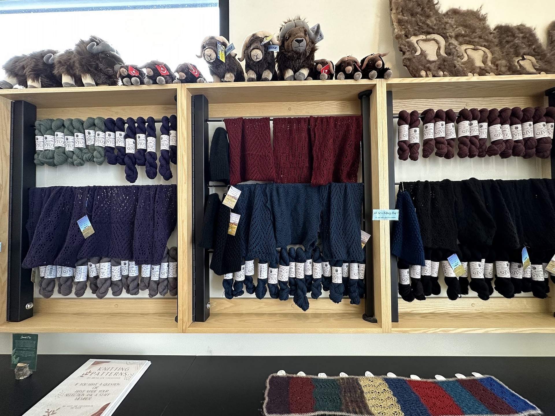 An array of finely crafted garnments made from qiviut line the walls of the gift shop at the Musk Ox Farm in Palmer, Alaska