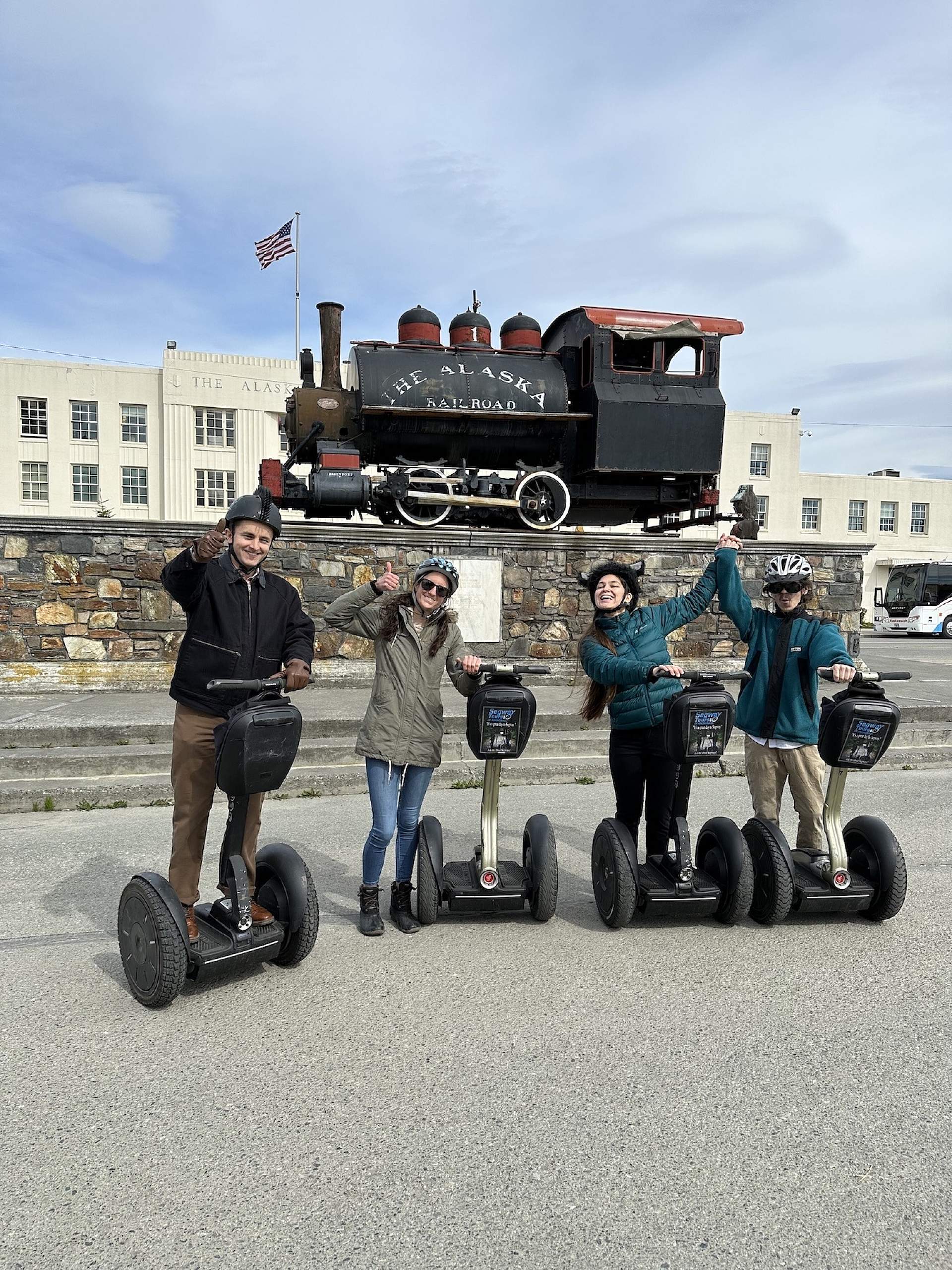 A group of Segways pose in front of the Alaska Railroad Depot in Anchorage, Alaska.