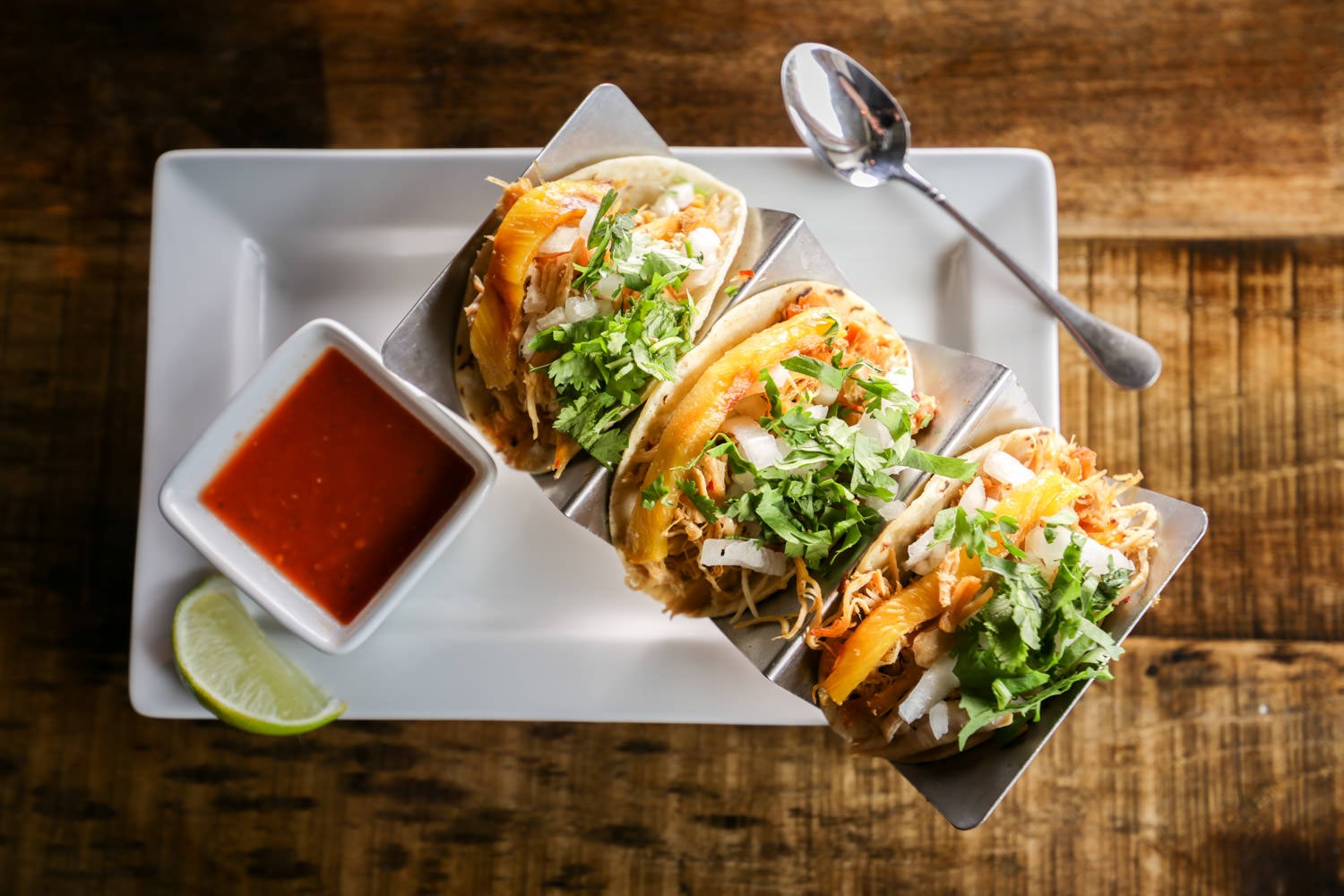 Plate of tacos from Tequila 61