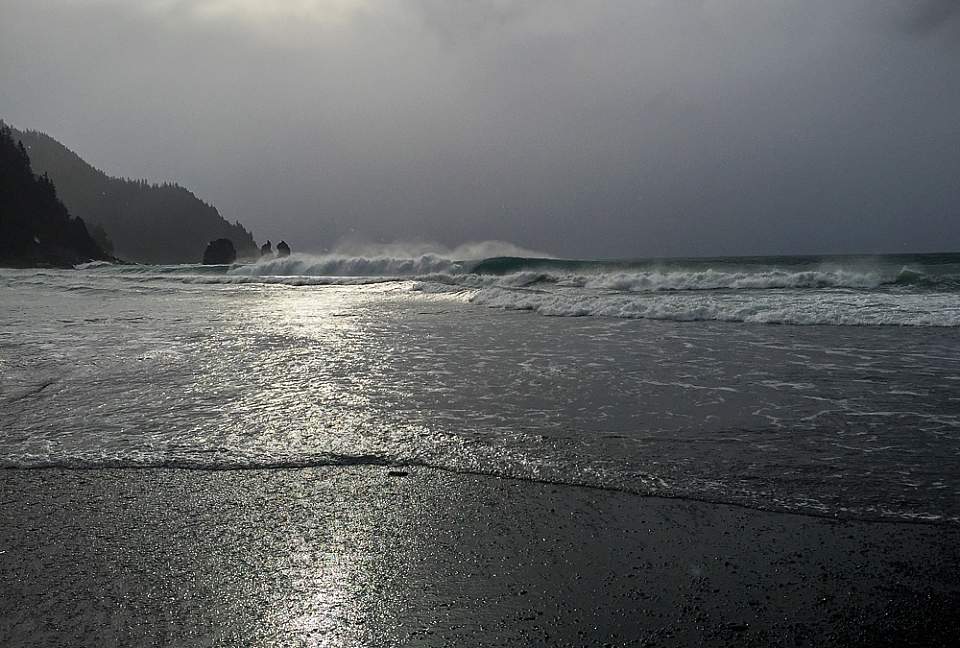 View of the waves and beach from Johnstone Bay