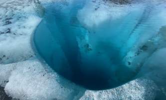 A blue pool that used to be a moulin