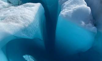 Moulin filled blue pool