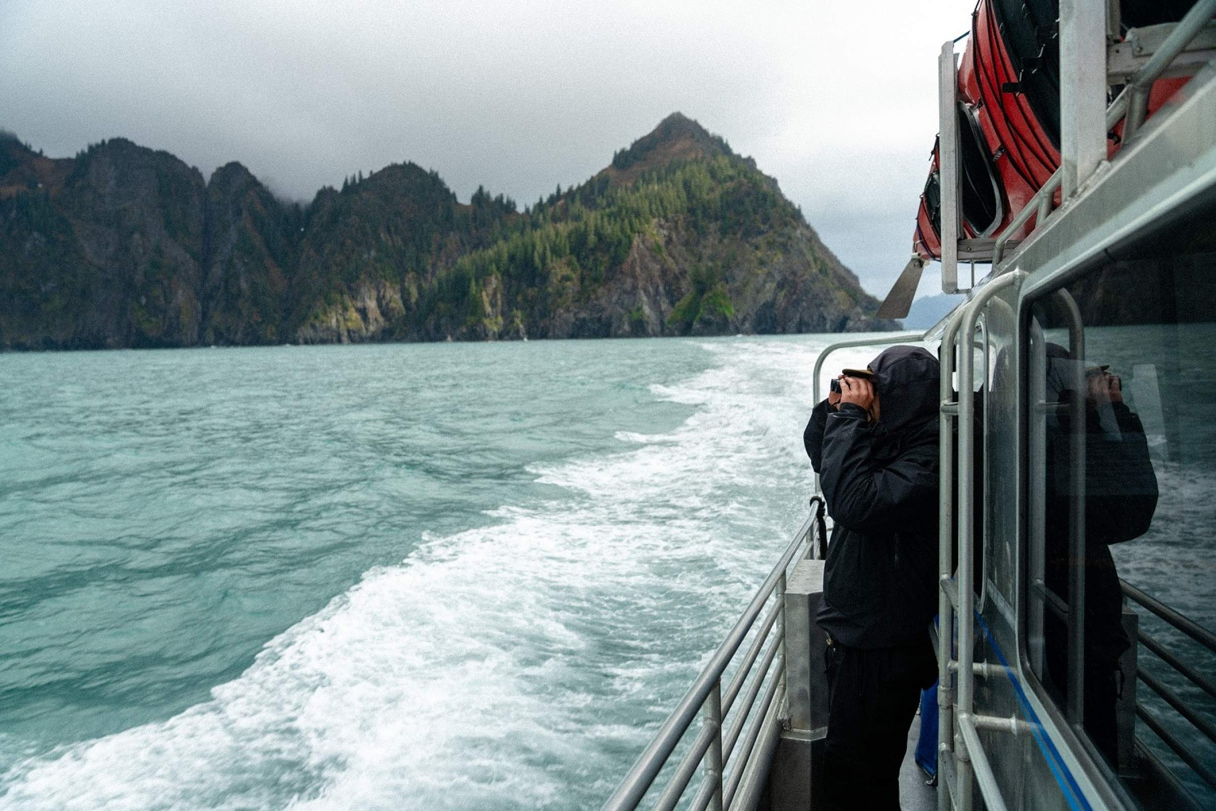 Boat cruising through Kenai Fjords National Park