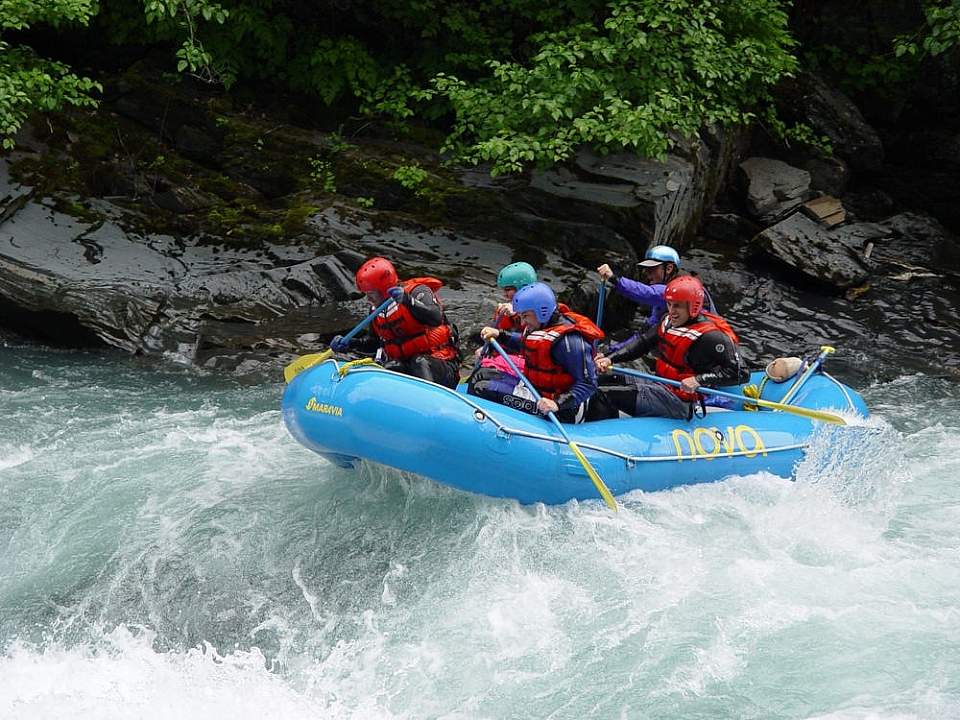 A group splashes down Six Mile Creek with NOVA Alaska Guides