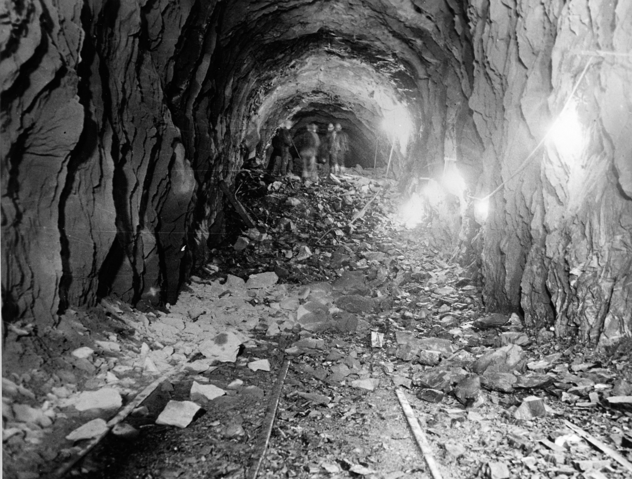 An old black and white view of the Anton Anderson Memorial Tunnel during it's construction.