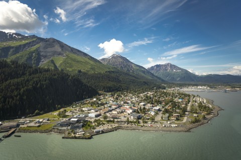 Stroll the waterfront trails of Seward with a magnificent mountain backdrop