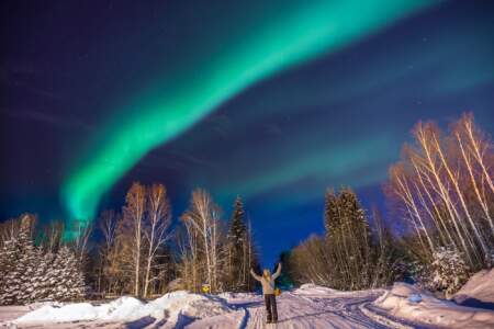 Gondwana Ecotours Northern Lights D8 Guest posing with Aurora Kirsten Marquez
