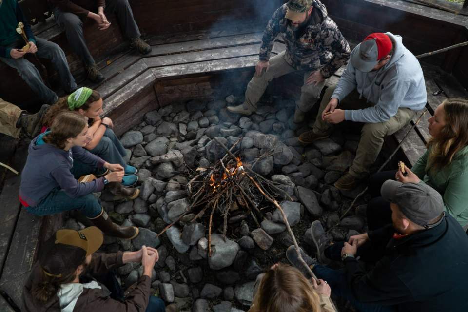 Make s'mores around the campfire at Wood River Lodge