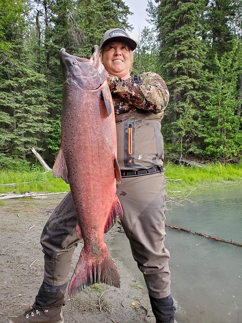 Woman holds king salmon fishing the klutina and gulkana rivers