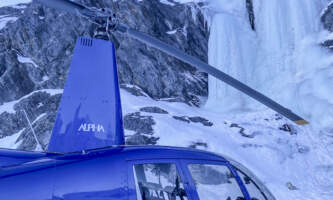 Alaska Helicopter Tours Ice Climbing Waterfall with R 44 landed Dawn Campbell