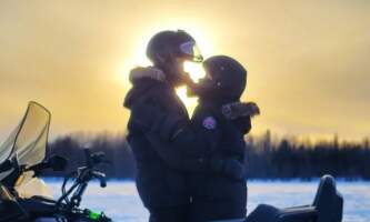 Alaska Wildlife Guide snowmachine couple Kyle
