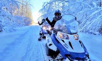 Alaska Wildlife Guide Snowmobiling in Alaska thumbs up for snowmobiling 22019