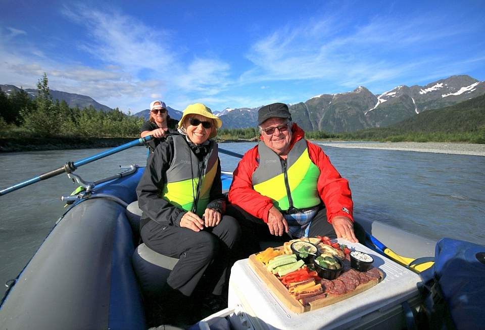 After exploring the glacier, enjoy a 7-mile raft trip through the mellow Class I and II waters of the Placer River.