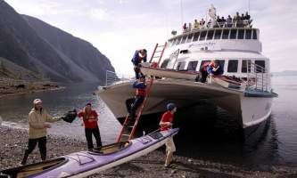 Glacier bay lodge GB boat kayak unload
