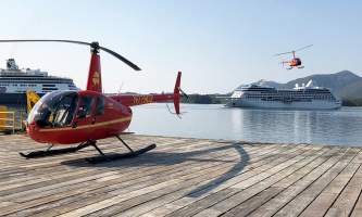 Helicopter Air Alaska 2 helis and cruise ship at dock2019