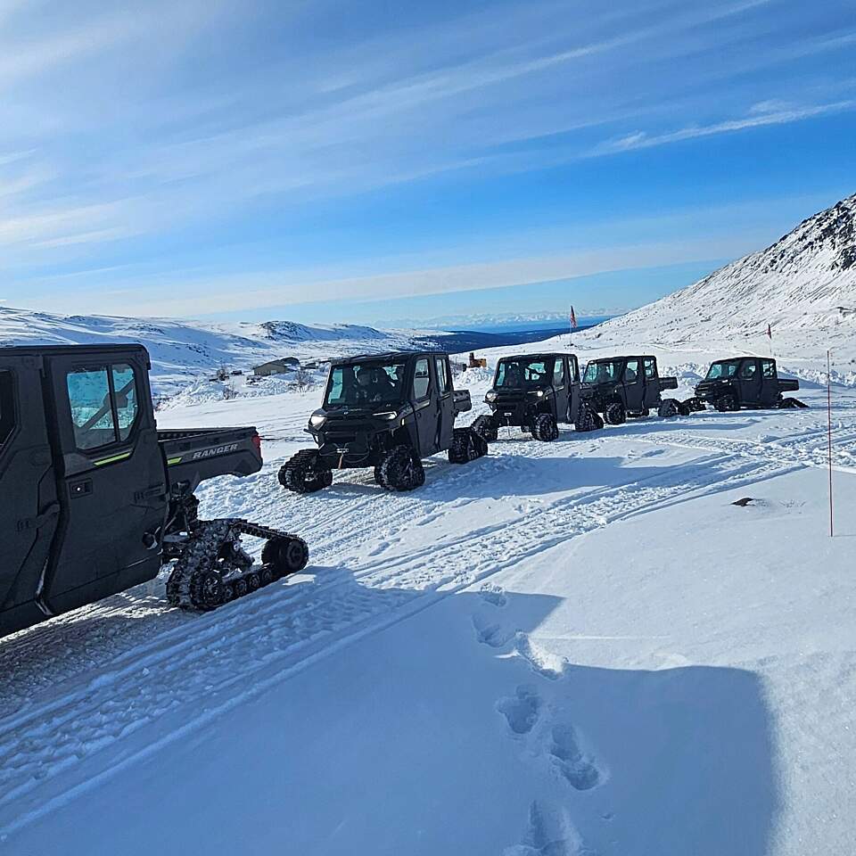 Embark on a breathtaking winter adventure with Hatcher Pass ATV Tours! Warm up in a heated UTV cabin and enjoy stunning views of the Talkeetna Mountains.