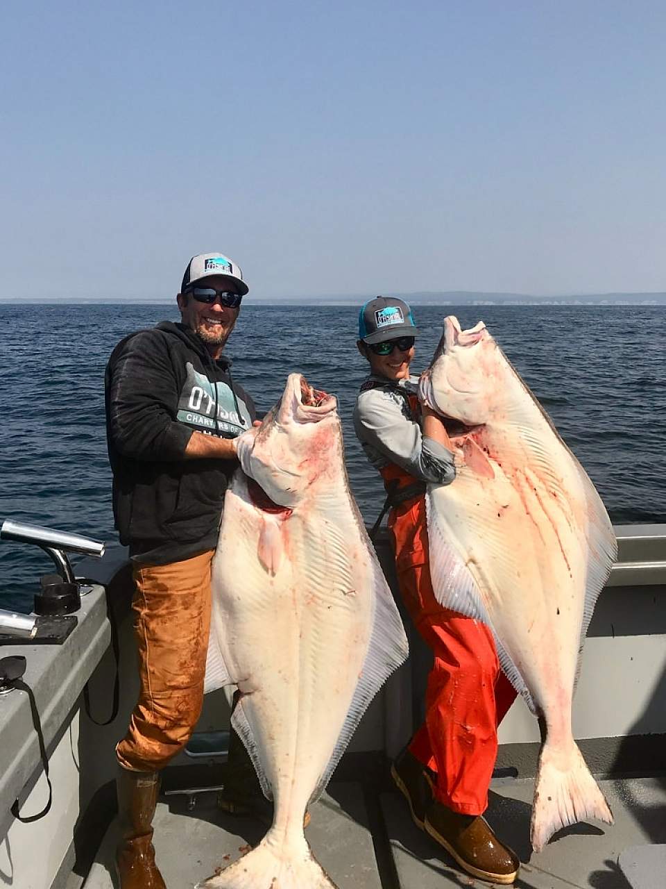 O'Fish'ial Charters of Alaska Chad Matthews and deckhand/son Austin in Homer, AK