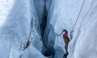 Ice climber climbs a unique glacial feature Anya Voskresensky