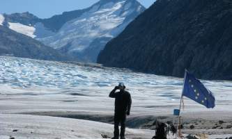 Alaska temsco skagway glacier discovery by helicopter tour Guide with AK Flag TEMSCO Skagway Glacier Discovery by Helicopter Tour