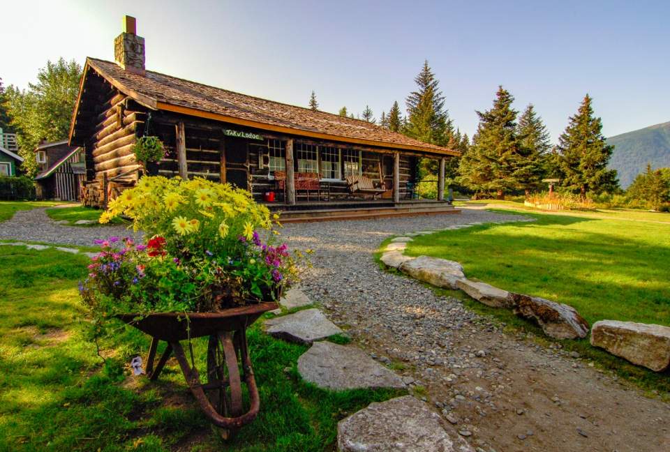 Outside view of the rustic cabin style Take Glacier Lodge.