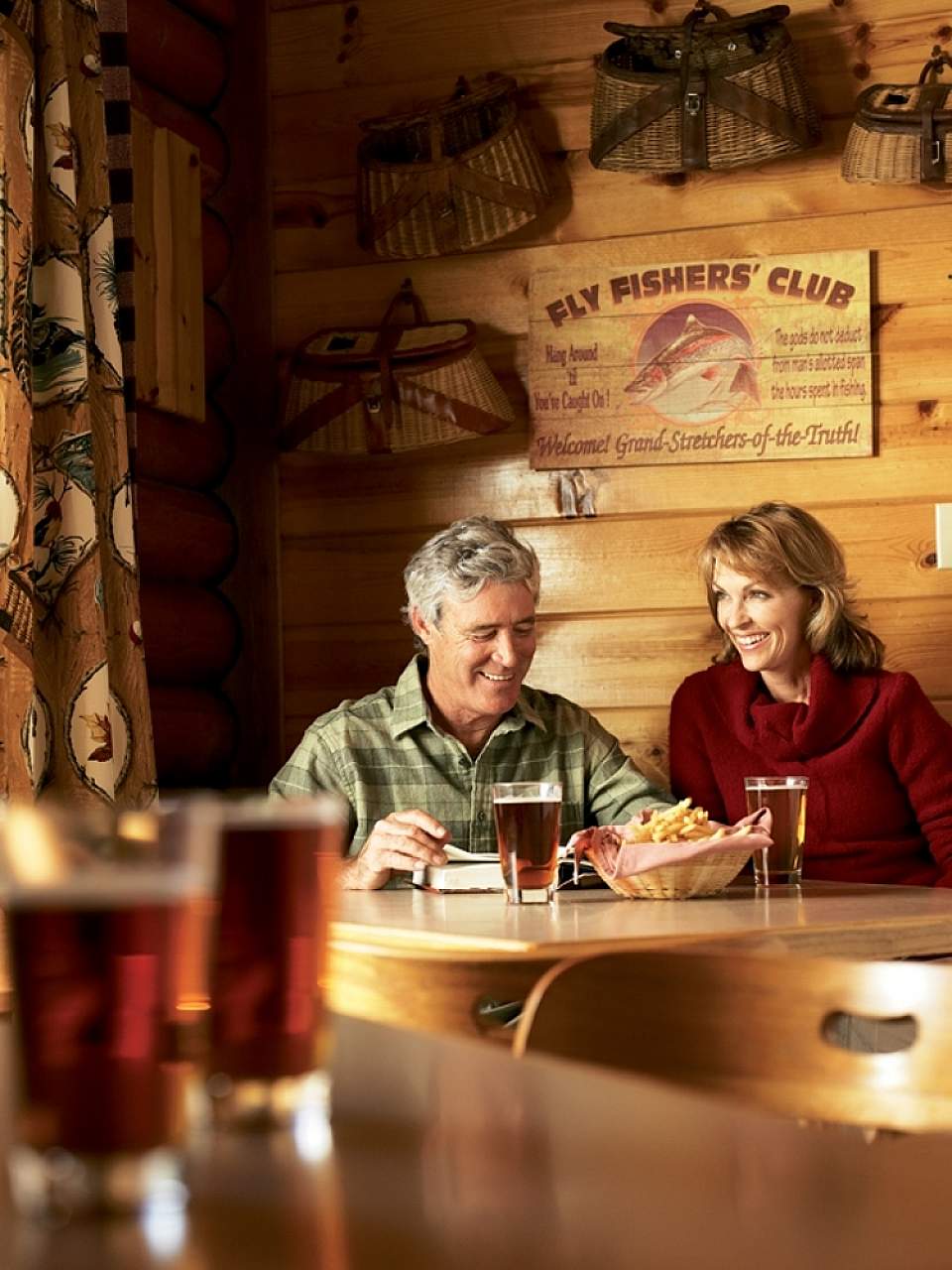 Rafter's Lounge is a laid-back bar with a deck overlooking the Kenai River that serves delicious drinks.