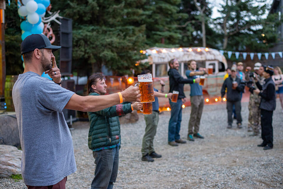 A group of people participate in Augtoberfest at 49th State Brew in Denali.