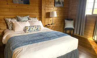 Alaska Glacier Lodge Cabin with new blankets pillows Dawn Campbell