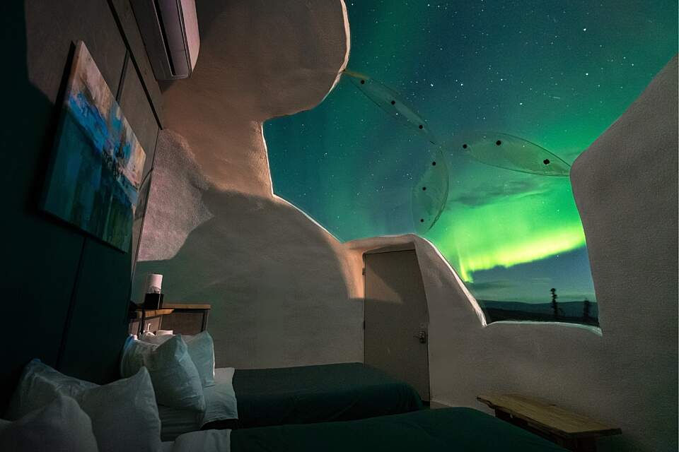 Each igloo has cozy furnishings, a private bath, and breakfast bar.