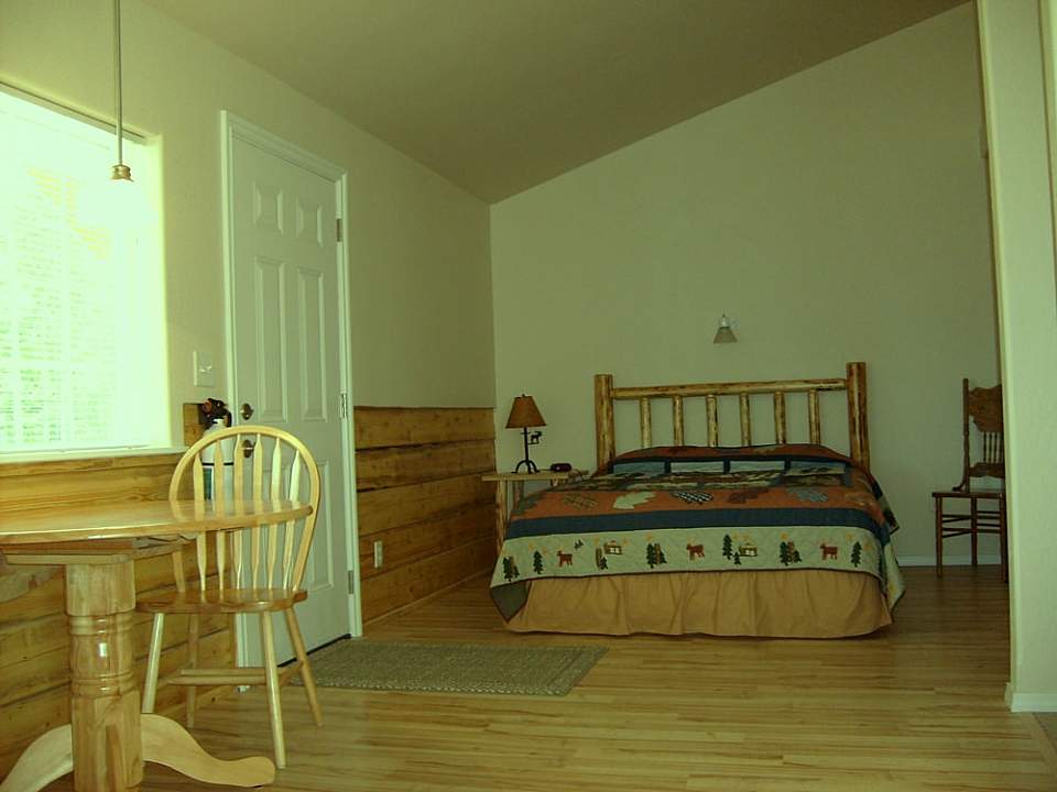 TV, a private bath, wi-fi and cozy gas fireplace in all suites & cabins