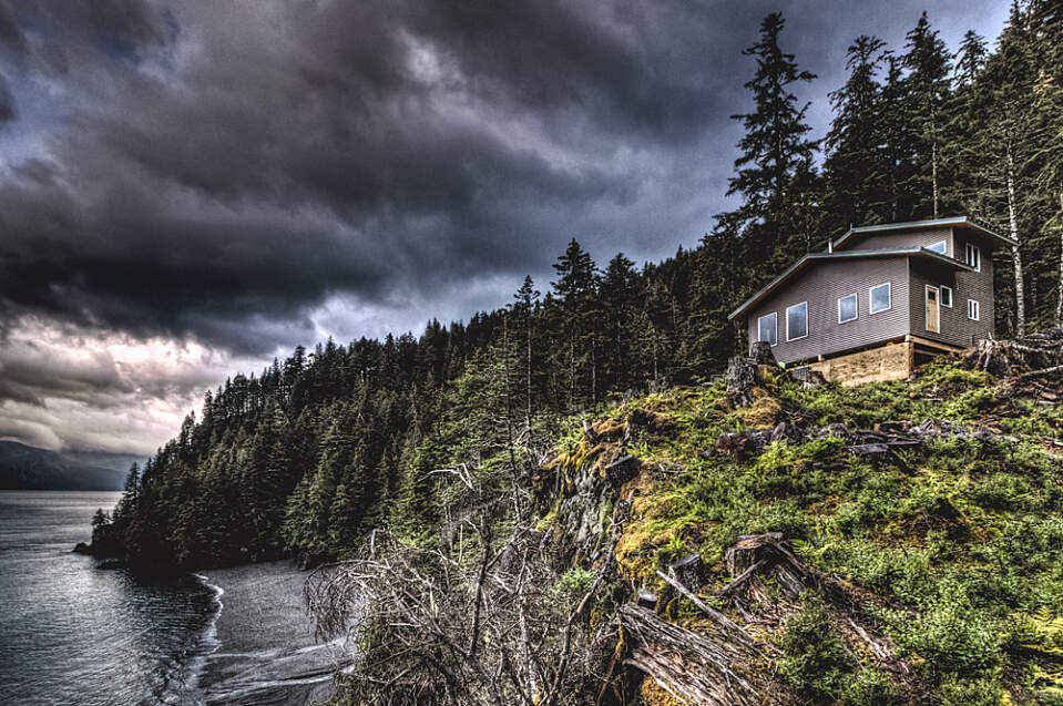 Perched on a 200-foot cliff near Seward, Granite Point Cabins offers a secluded Alaskan getaway with sweeping Resurrection Bay views and endless outdoor adventure.