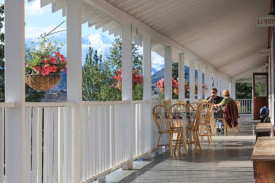 Dine or relax on the front porch, with views of Kennicott Glacier
