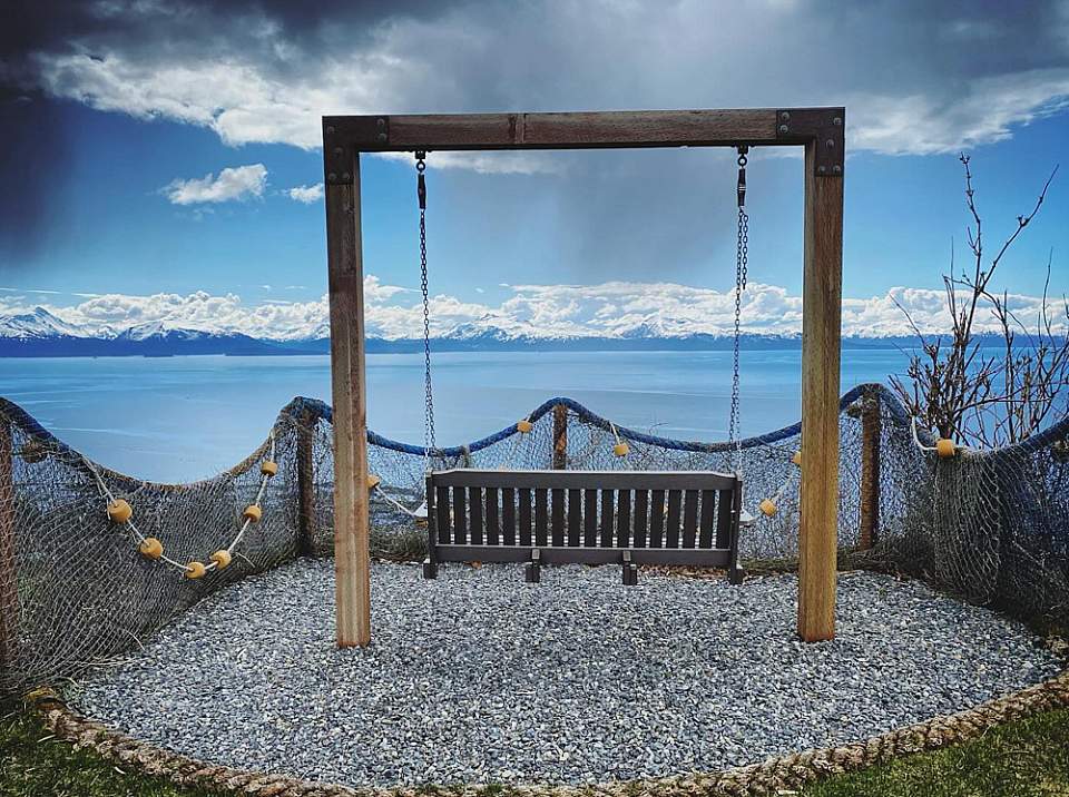 Luxury cabins at Seafarer at Baycrest overlook Kachemak Bay from more than 500 feet above the water, with sweeping views of the Kenai Mountains.