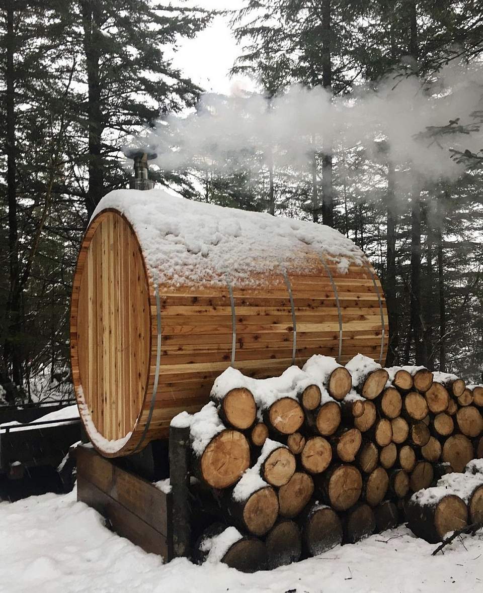 Wood barrel sauna in winter