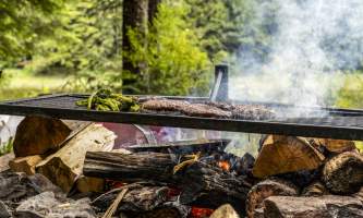 The lodge at whale pass Burgers and brocollini on fire horizontal Lucas Ryter