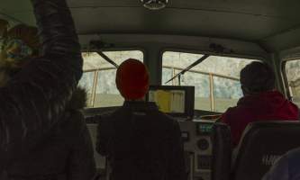 The lodge at whale pass Dark cabin with glacier in window Lucas Ryter