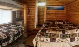 Three Moose Cabins inside of cabin Jennie Hess