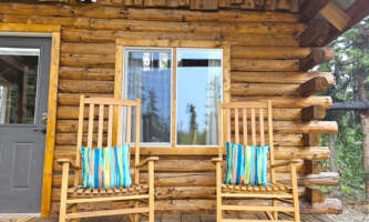 AK Cabin Rocking Chairs on Deck A AK Marketing Images 2023 Victoria Regoalaska org wrangell mountain wilderness lodge