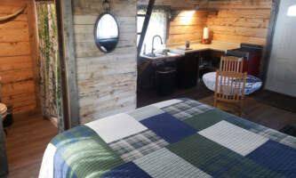 Raven bath kitchen from bed A AK Marketing Images 2023 Victoria Regoalaska org wrangell mountain wilderness lodge