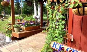Alaska Tka porch out to garden Aug 2017 kahiltna birch works